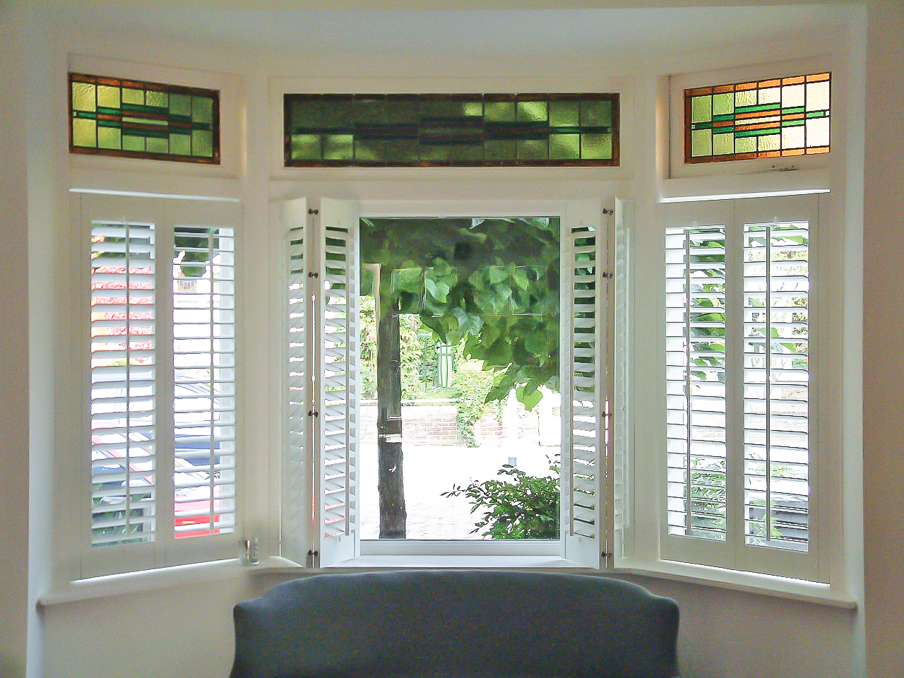 we install wooden bay window shutters in Sussex and London